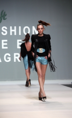 ZAGREB, CROATIA - May 10: Fashion model wears clothes made by Kristina Burja on "ZAGREB FASHION WEEK" show on May 10, 2012 in Zagreb, Croatia.のeditorial素材