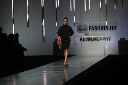 ZAGREB, CROATIA - MARCH 13: Fashion model wears clothes made by Aleksandra Dojcinovic on "PERWOLL FASHION.HR" show on March 13, 2013 in Zagreb, Croatia.のeditorial素材