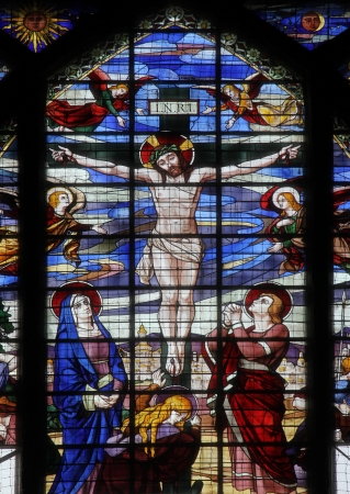 Crucifixion, Jesus on the cross, stained glass window from Saint-Jean de Montmartre church, Parisのeditorial素材