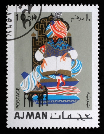 AJMAN - CIRCA 1967  stamp printed by Ajman shows Oriental fairy tales, circa 1967のeditorial素材