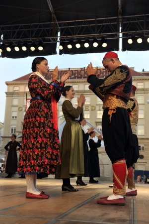 ZAGREB,CROATIA - JULY 19: Members of folk groups Marko Marojica from Zupa Dubrovacka in Croatia national costume during the 47th International Folklore Festival in center of Zagreb,Croatia on July 19,2013のeditorial素材