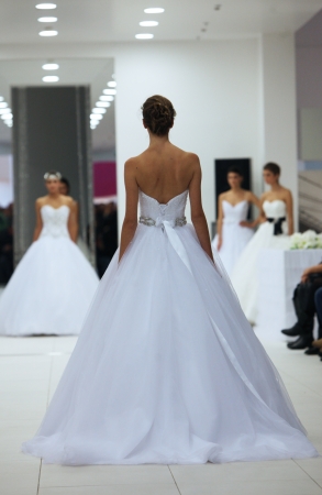 Fashion model in wedding dress made by Lisa and Maggie Sottero on  Wedding Expo  show in the Westgate Shopping City in Zagreb, Croatia on October 12, 2013のeditorial素材