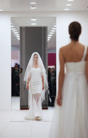 Fashion model in wedding dress made by Silhuete Bride on  Wedding Expo  show in the Westgate Shopping City in Zagreb, Croatia on October 12, 2013のeditorial素材