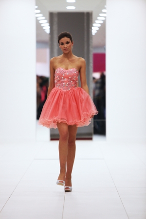 Fashion model in cocktail dress made by Ana Milani on  Wedding Expo  show in the Westgate Shopping City in Zagreb, Croatia on October 12, 2013のeditorial素材