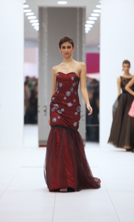 Fashion model in cocktail dress made by Ana Milani on  Wedding Expo  show in the Westgate Shopping City in Zagreb, Croatia on October 12, 2013のeditorial素材
