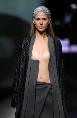 Fashion model wearing clothes designed by Petra Vuletic and Sasa Hortig on the  Fashion hr  show on October 17, 2013 in Zagreb, Croatia のeditorial素材