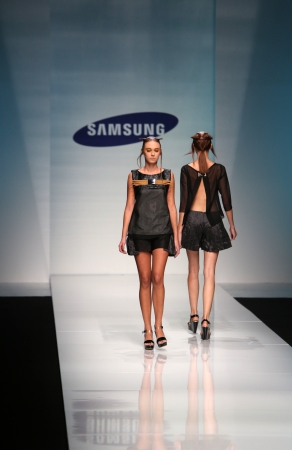 ZAGREB, CROATIA - OCTOBER 17: Fashion model wearing clothes designed by Marina Design on the 'Fashion.hr' show on October 17, 2013 in Zagreb, Croatia.のeditorial素材