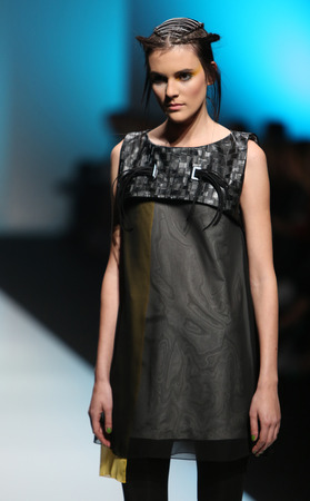 ZAGREB, CROATIA - OCTOBER 17: Fashion model wearing clothes designed by Marina Design on the 'Fashion.hr' show on October 17, 2013 in Zagreb, Croatia.のeditorial素材