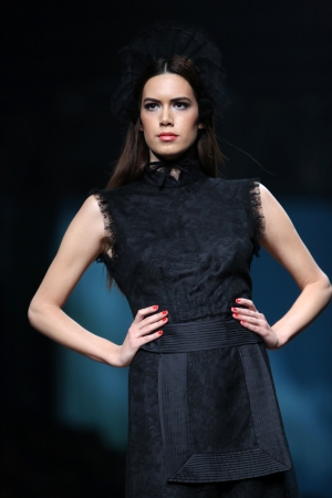 Fashion model wearing clothes designed by Borna and Fils on the Cro a Porter show on October 25, 2013 in Zagreb, Croatia.のeditorial素材