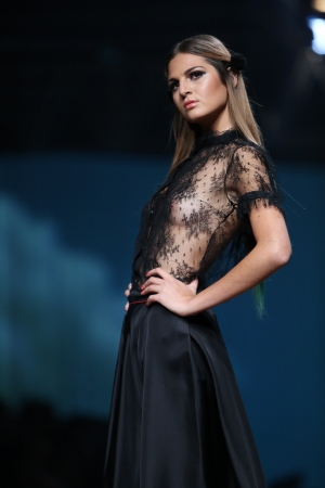 Fashion model wearing clothes designed by Borna and Fils on the Cro a Porter show on October 25, 2013 in Zagreb, Croatia.のeditorial素材