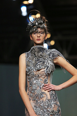 Fashion model wearing clothes designed by Matija Vuica on the Cro a Porter show on October 23, 2013 in Zagreb, Croatia.のeditorial素材