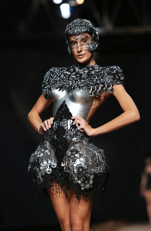 Fashion model wearing clothes designed by Matija Vuica on the Cro a Porter show on October 23, 2013 in Zagreb, Croatia.のeditorial素材