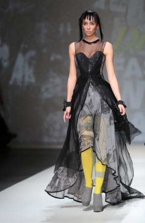 Fashion model wearing clothes designed by Phannatiq on the Zagreb Fashion Week show on November 22, 2013 in Zagreb, Croatia.のeditorial素材