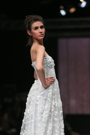 ZAGREB, CROATIA - MARCH 29: Fashion model wearing clothes designed by Envy Room on the 'Fashion.hr' show on March 29, 2014 in Zagreb, Croatia.のeditorial素材