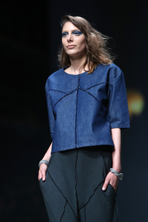 ZAGREB, CROATIA - APRIL 09 : Fashion model wears clothes made by Vedrana Mastela on "CRO A PORTER" show on April 09, 2014 in Zagreb, Croatiaのeditorial素材