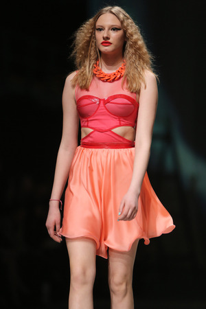 Fashion model wears clothes made by Linea Exclusive on "CRO A PORTER" show on April 12, 2014 in Zagreb, Croatiaのeditorial素材
