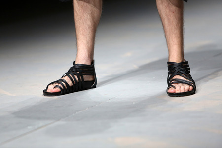 Fashion model wears shoes made by Ivan Ledenko on "CRO A PORTER" show on April 11, 2014 in Zagreb, Croatia.のeditorial素材