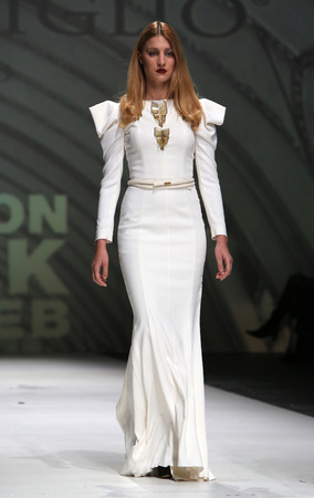 Fashion model wearing clothes designed by Avaro Figlio on the Zagreb Fashion Week on May 09, 2014 in Zagreb, Croatia.のeditorial素材