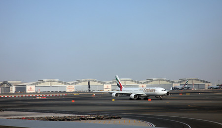 Emirates Airbus A340 at Dubai Airport on December 09, 2012 in Dubai, UAE  Emirates handles major part of passenger traffic and aircraft movements at the airport のeditorial素材