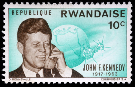 Stamp printed by Rwanda, shows John Fitzgerald Kennedy, circa 1964のeditorial素材