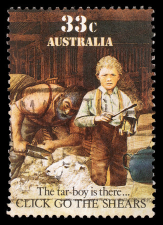 Stamp printed in Australia shows sheepshearing, Tar-boy is there, circa 1986のeditorial素材
