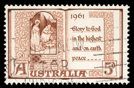 Australian postage stamp shows The Holy Virgin Mary and baby Jesus, circa 1961のeditorial素材