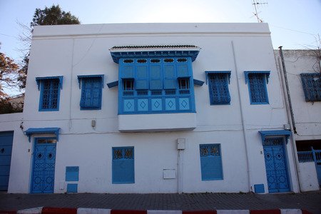 Sidi Bou Said - typical building with white walls, blue doors and windowsのeditorial素材