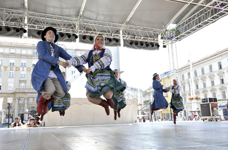 Folk group Selkirk, Manitoba, Ukrainian Dance Ensemble Troyanda from Canada during the 48th International Folklore Festival in center of Zagreb, Croatia on July 18, 2014のeditorial素材