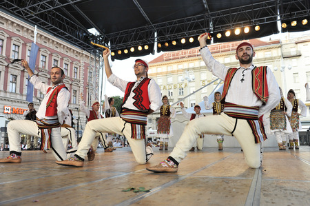Members of folk group Albanian Culture Society Jahi Hasani from Cegrane, Macedonia during the 48th International Folklore Festival in center of Zagreb,Croatia on July 19,2014のeditorial素材