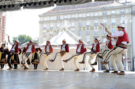 Members of folk group Albanian Culture Society Jahi Hasani from Cegrane, Macedonia during the 48th International Folklore Festival in center of Zagreb,Croatia on July 20,2014のeditorial素材
