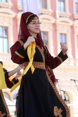 Members of folk group Albanian Culture Society Jahi Hasani from Cegrane, Macedonia during the 48th International Folklore Festival in center of Zagreb,Croatia on July 20,2014のeditorial素材