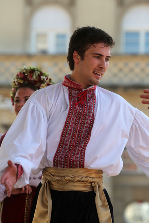 Folk group Selkirk, Manitoba, Ukrainian Dance Ensemble Troyanda from Canada during the 48th International Folklore Festival in center of Zagreb, Croatia on July 18, 2014のeditorial素材