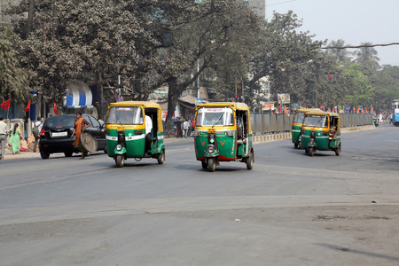 Private auto rickshaw three-weeler tuk-tuk taxi drives down the street on February 08, 2014 in...