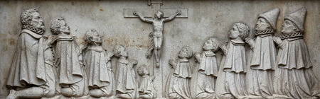 An old crucifixion relief sculpture outside St. Stephen Cathedral in Vienna, Austria on October 10, 2014.のeditorial素材