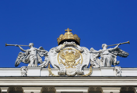 Architectural artistic decorations on Hofburg palace, Vienna; Austria. Hofburg was residence of Habsburg dynasty, rulers of Austro-Hungarian Empire. Vienna, Austria on October 10, 2014.のeditorial素材