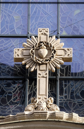 Cross on portal of Parish Church of the Holy Blood in Graz, Styria, Austria on January 10, 2015.のeditorial素材