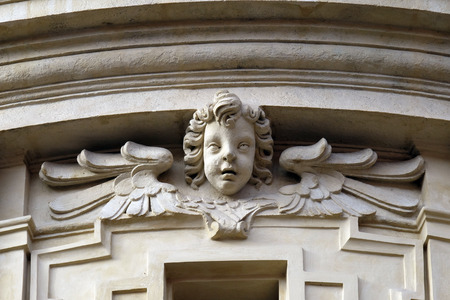 Angel on the portal of St. Catherine church and Mausoleum of Ferdinand II, Graz, Austria on January 10, 2015.のeditorial素材