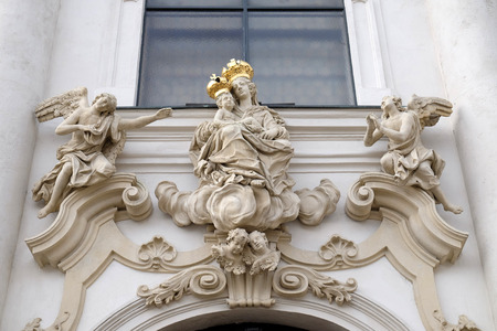 Virgin Mary with baby Jesus on the portal of Mariahilf church in Graz, Styria, Austria on January 10, 2015.のeditorial素材