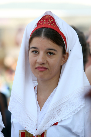 Members of folk group Natko Nodilo from Babino Polje, Croatia during the 49th International Folklore Festival in center of Zagreb, Croatia on July 18, 2015のeditorial素材