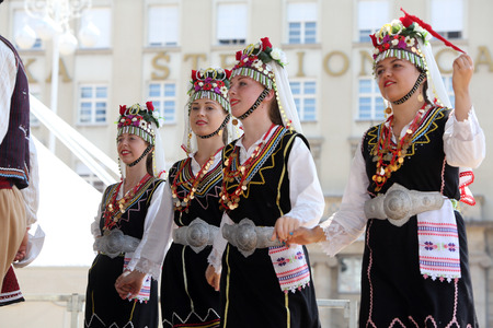 Members of folk group Kitka from Istibanja, Macedonia during the 49th International Folklore Festival in center of Zagreb, Croatia on July 17, 2015のeditorial素材