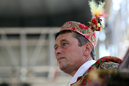 Members of folk group Dubrovacki primorski svatovi from Gornja Sela, Croatia during the 49th International Folklore Festival in center of Zagreb, Croatia on July 17, 2015のeditorial素材