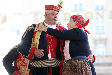 Members of folk group Dubrovacki primorski svatovi from Gornja Sela, Croatia during the 49th International Folklore Festival in center of Zagreb, Croatia on July 17, 2015のeditorial素材