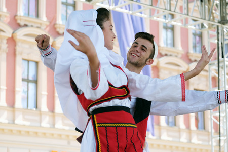 ZAGREB, CROATIA - JULY 19: Members of folk group Deshmoret e Kombit from Pristina, Kosovo during the 49th International Folklore Festival in center of Zagreb, Croatia on July 19, 2015のeditorial素材