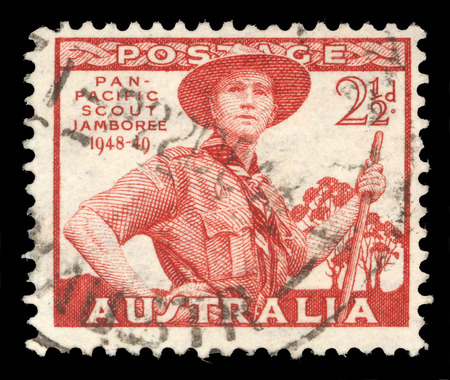 AUSTRALIA-CIRCA 1952: A stamp printed in Australia dedicated to Pan-Pacific Scout Jamboree, Victoria, portrayed Scout in Uniform, circa 1952のeditorial素材