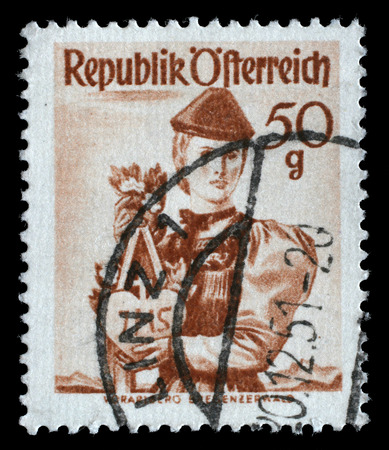 A stamp printed in Austria shows woman in national dress, Vorarlberg, Bregenzer Forest, circa 1949のeditorial素材