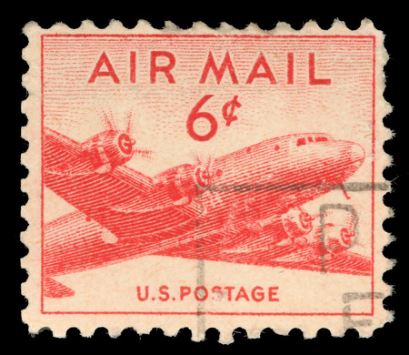 Stamp printed in United states USA, shows military transport aircraft Douglas C-54 DC-4 Skymaster , circa 1947のeditorial素材