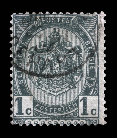 Stamp printed in Belgium shows Belgian coat of arms, circa 1893のeditorial素材