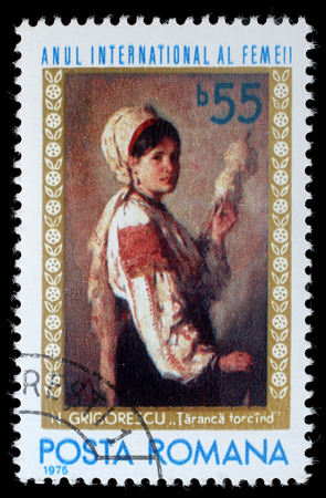 Stamp printed by Romania, shows picture "Woman spinning" by Nicolae Grigoresky, circa 1975のeditorial素材