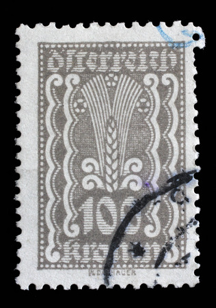 Stamp printed in Austria shows Symbols of Agriculture, circa 1922のeditorial素材