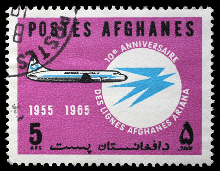 Stamp printed in the Afghanistan shows 10th Anniversary of ARIANA Air Lines, circa 1965のeditorial素材